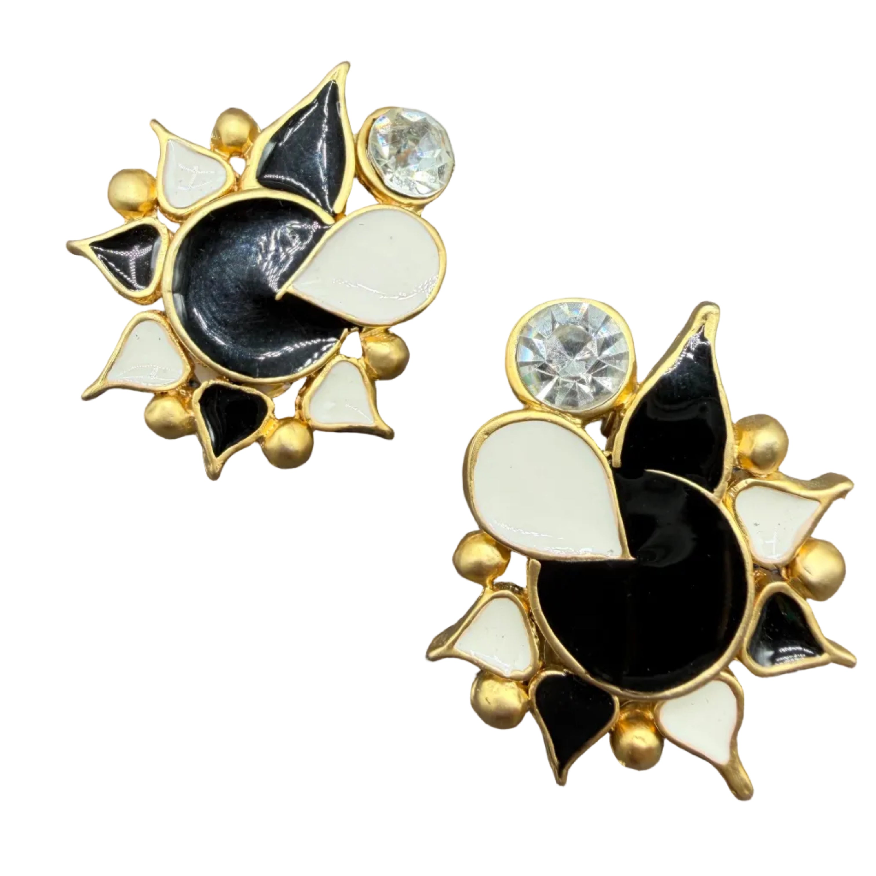 1980s Matte Gold-tone abstract flower clip on earrings with black & white enamel and clear rhinestone accent stone