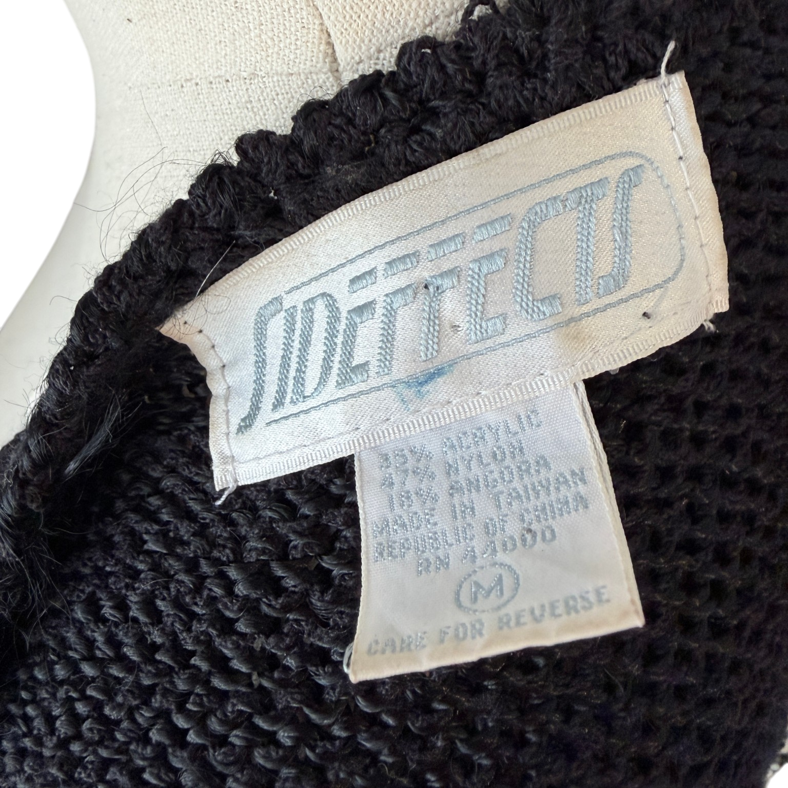 1980s Sideffects Black V-Neck Sweater with Beaded Appliqué Neckline and Angora Sleeves