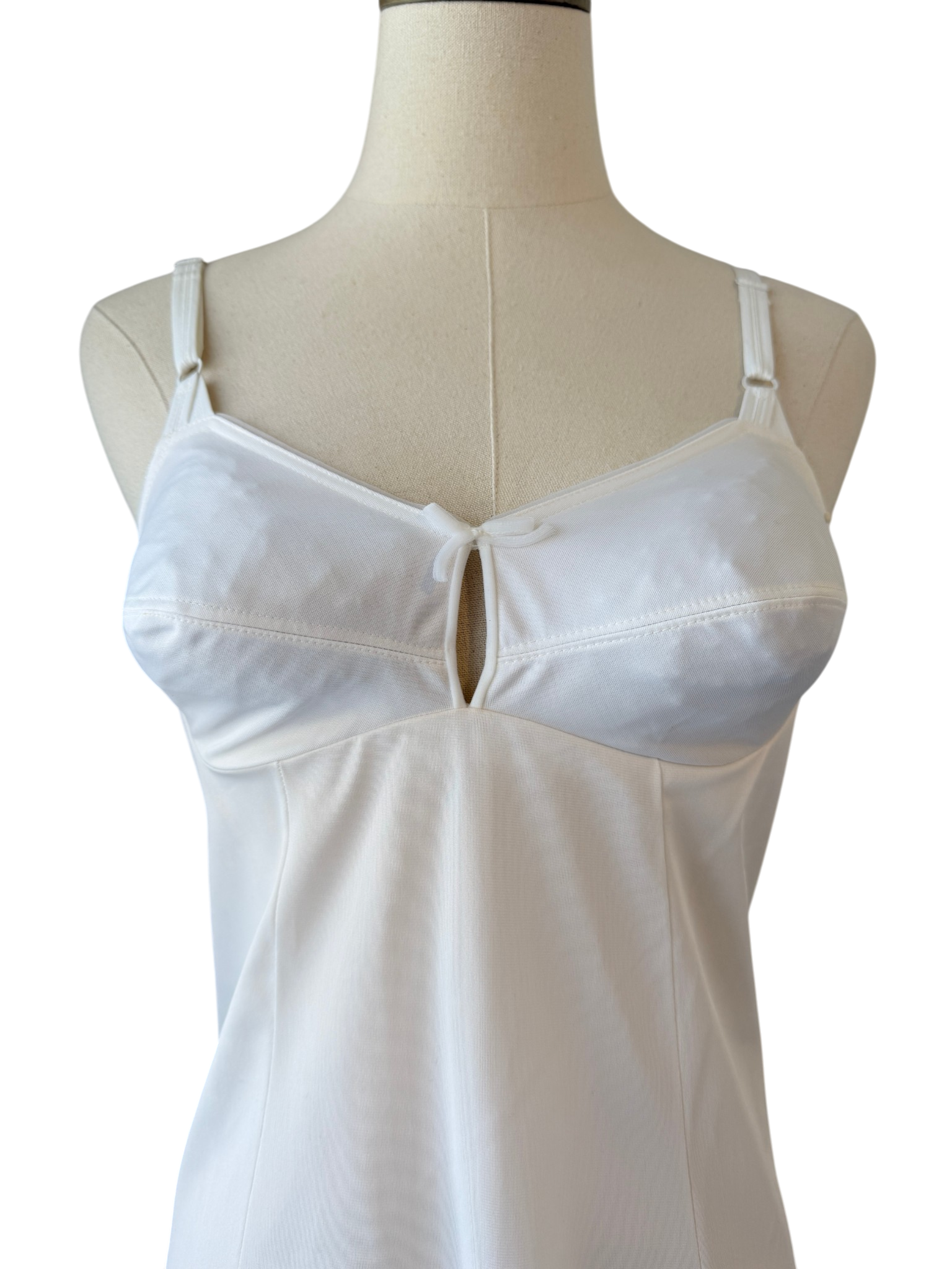 1950s Olga Nylon Ivory slip with key home chest detail and small bow hem details