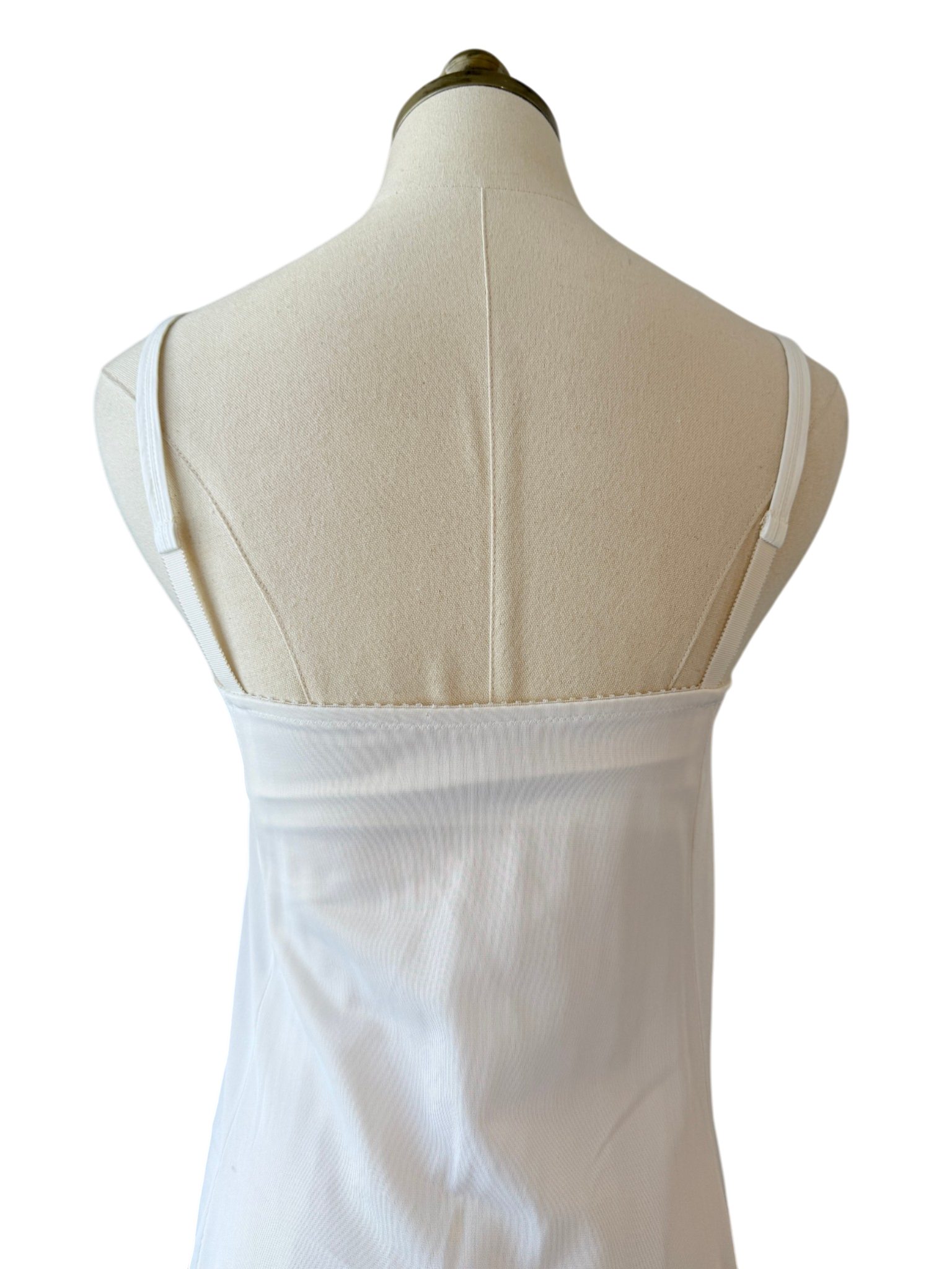1950s Olga Nylon Ivory slip with key home chest detail and small bow hem details