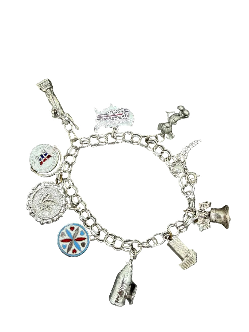 1970s API Sterling Silver Charm Bracelet with 10 Charms