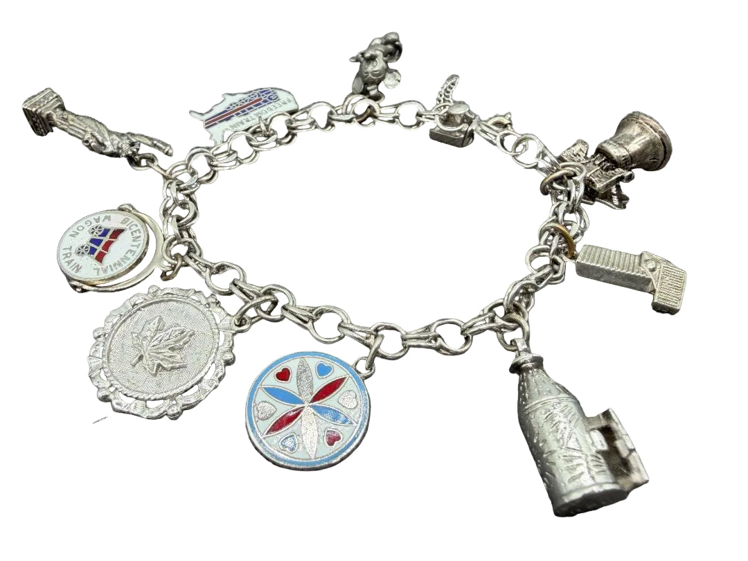 1970s API Sterling Silver Charm Bracelet with 10 Charms