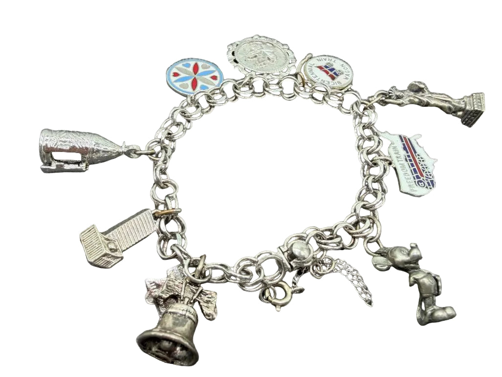 1970s API Sterling Silver Charm Bracelet with 10 Charms