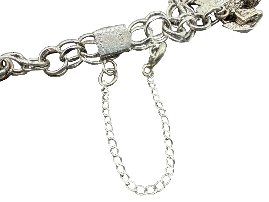 1970s API Sterling Silver Charm Bracelet with 10 Charms