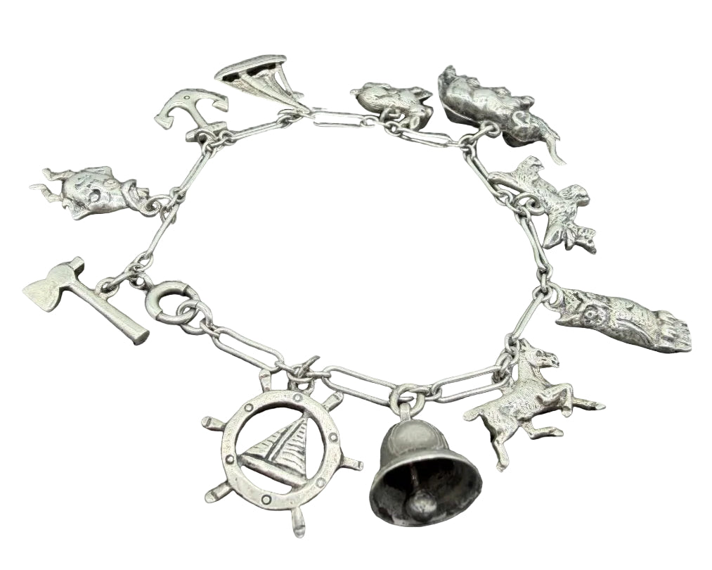 1970s Sterling Silver Paperclip Chain Charm Bracelet with 11 Charms