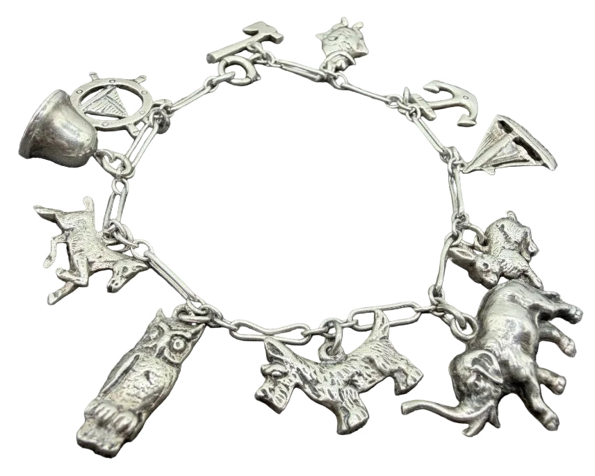 1970s Sterling Silver Paperclip Chain Charm Bracelet with 11 Charms