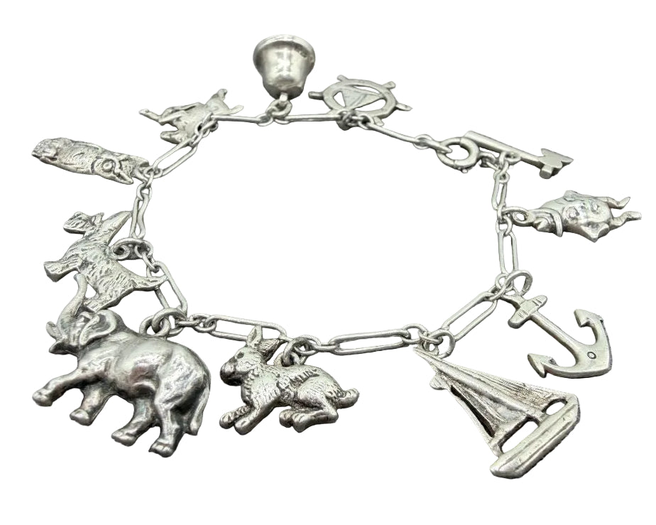 1970s Sterling Silver Paperclip Chain Charm Bracelet with 11 Charms