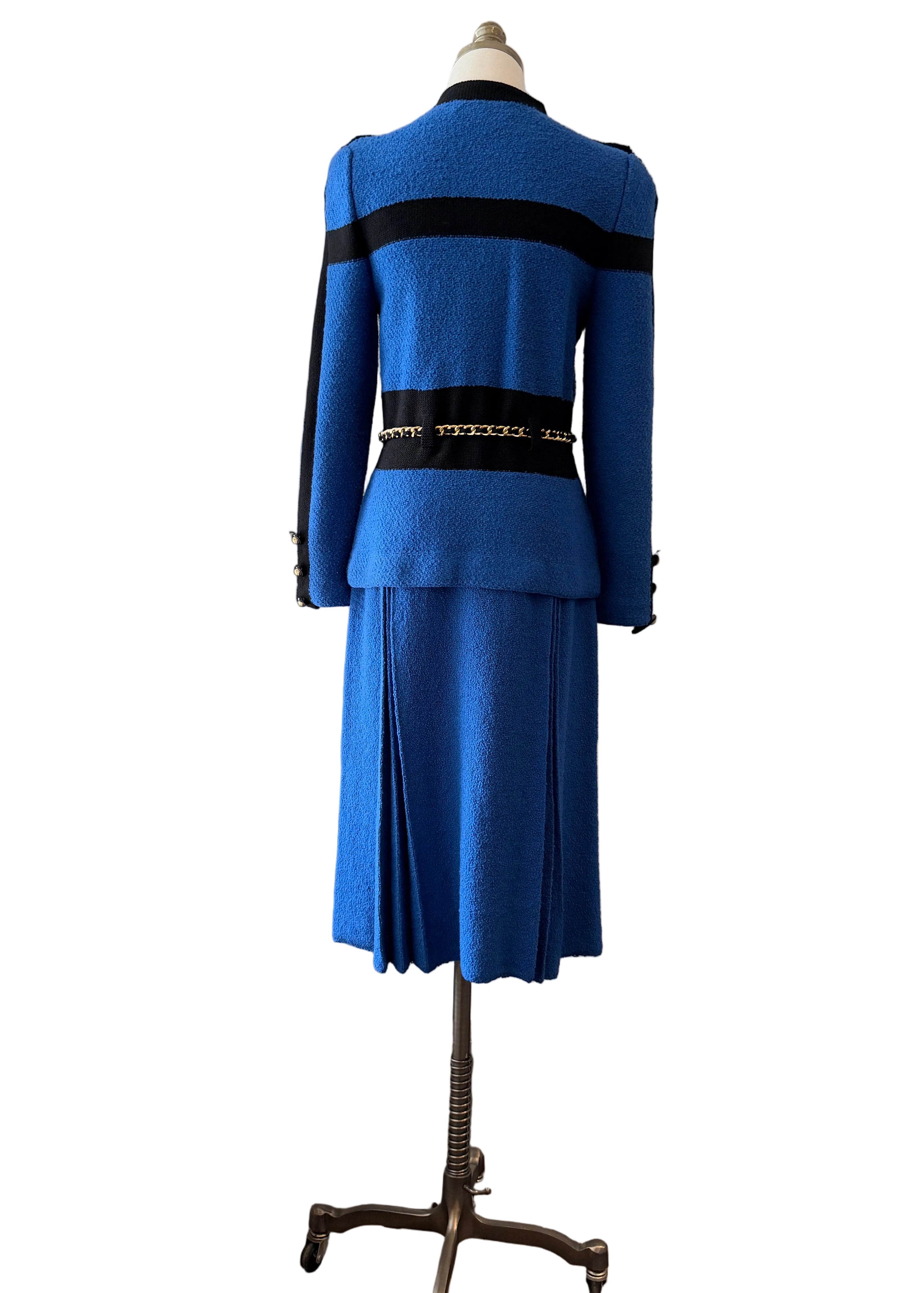 1960s Adolfo Royal Blue & Black Striped Knit Suit with Chain Belt & Pleated Hem Skirt