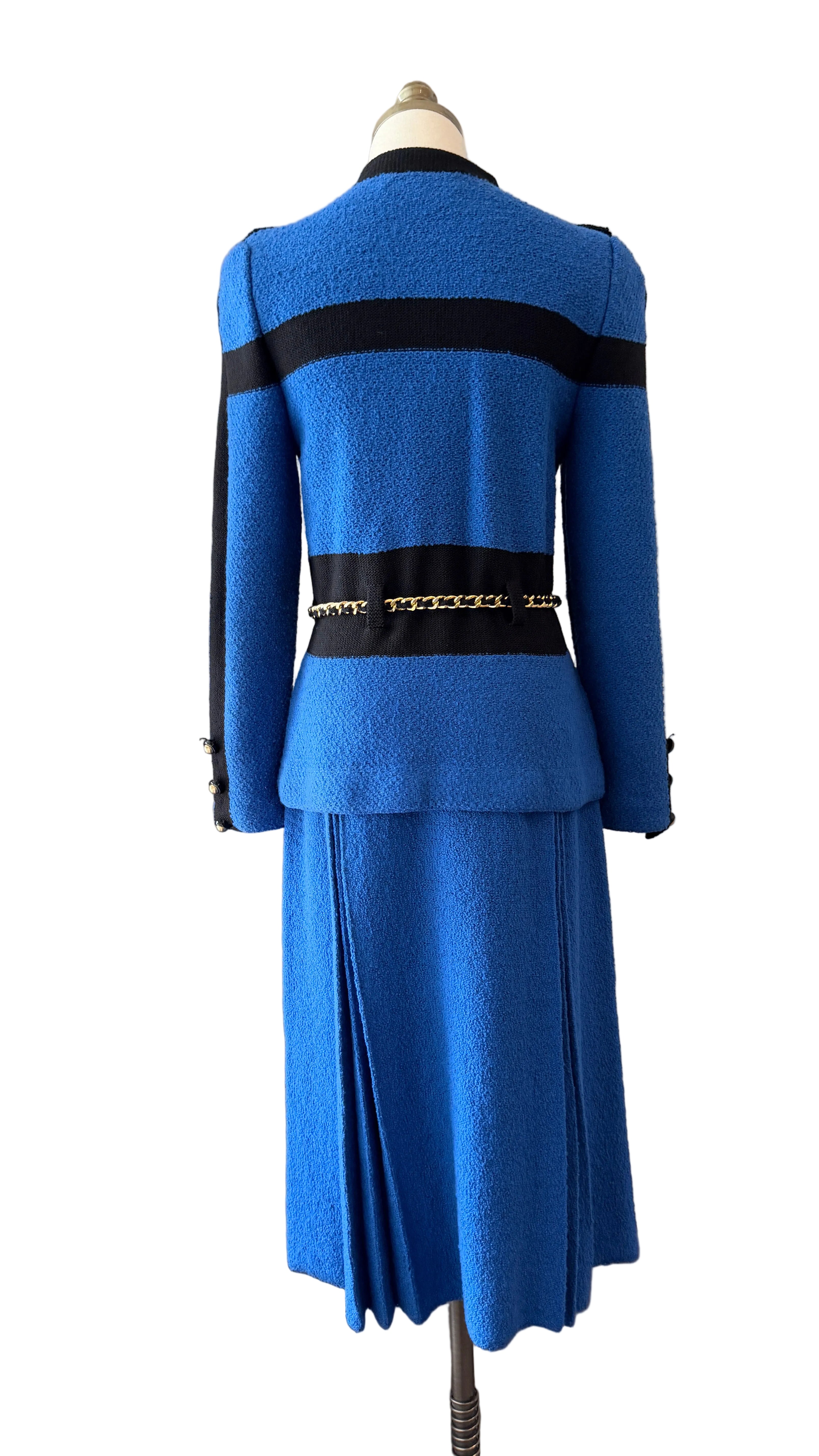 1960s Adolfo Royal Blue & Black Striped Knit Suit with Chain Belt & Pleated Hem Skirt