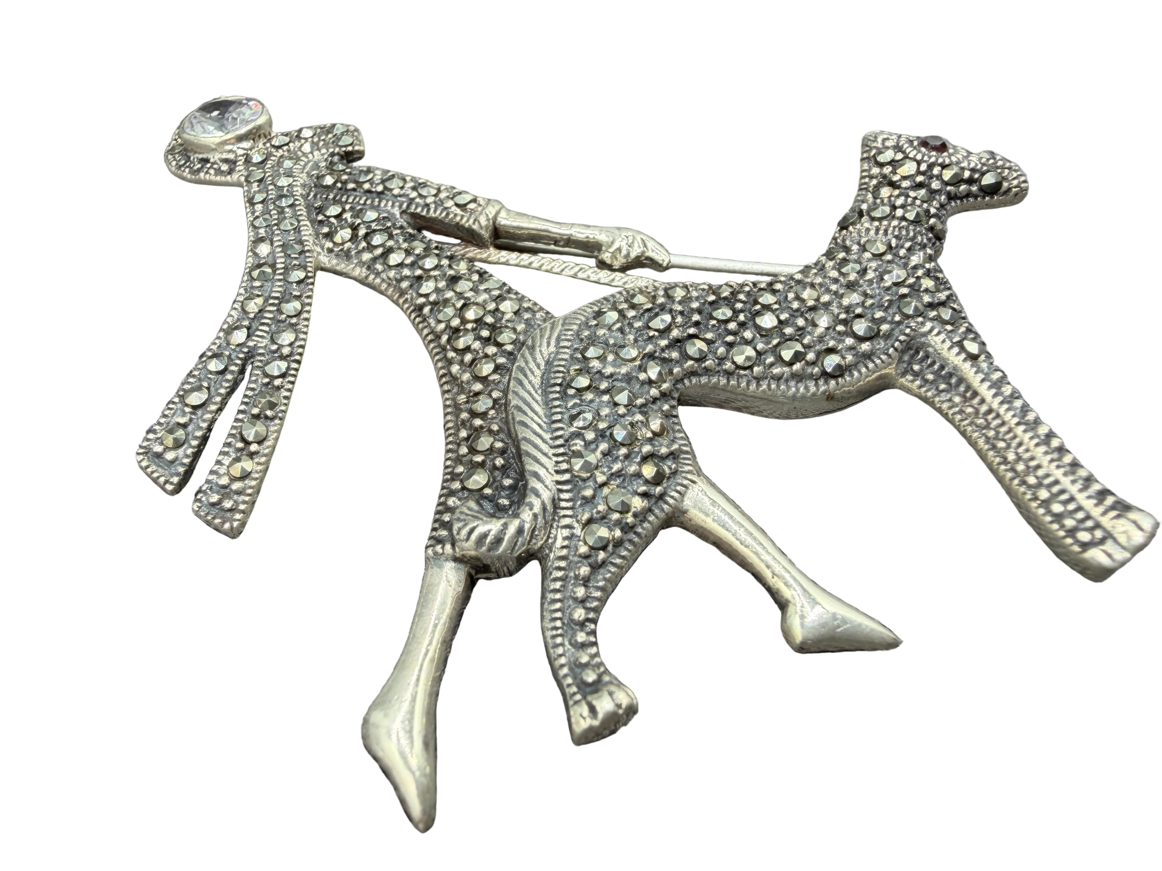1940s Sterling Silver & Marcasite Art Deco Woman Walking Dog Brooch with Ruby Eye