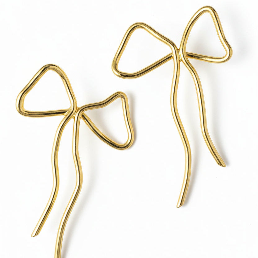Anita Berisha gold tone statement bow earrings