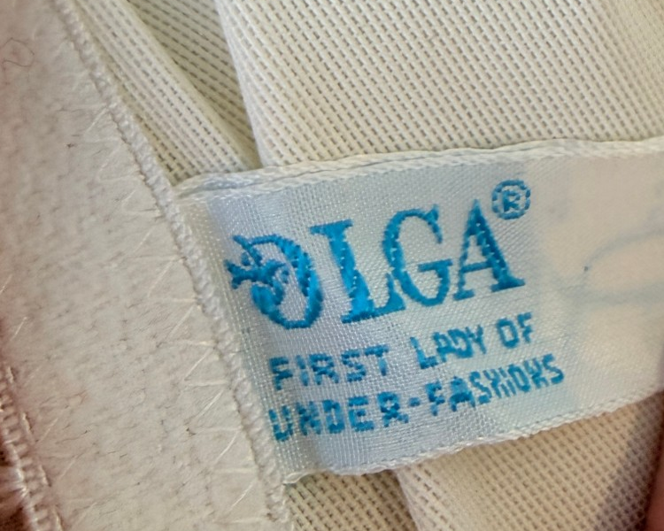 1950s Olga Nylon Ivory slip with key home chest detail and small bow hem details