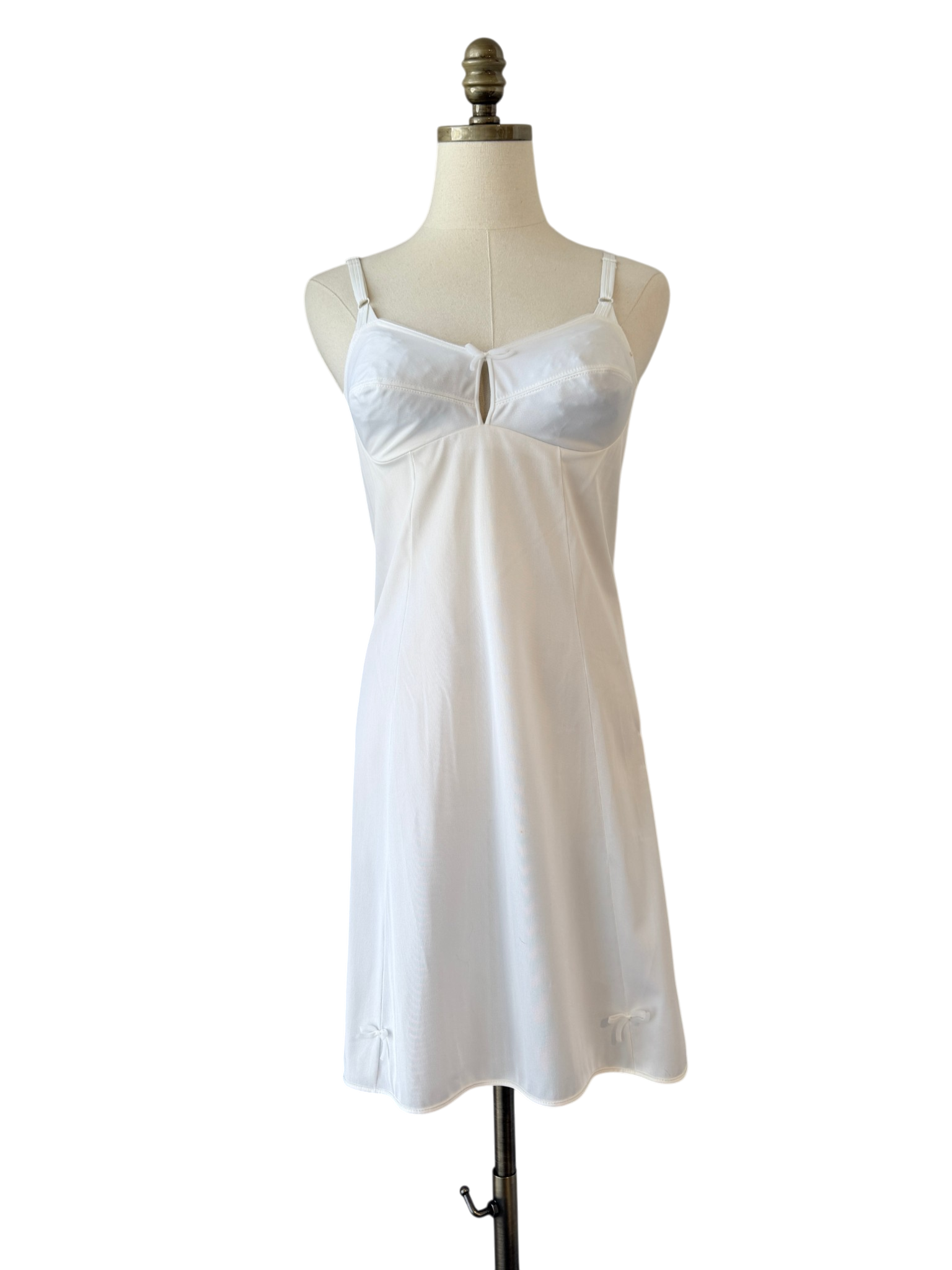 1950s Olga Nylon Ivory slip with key home chest detail and small bow hem details