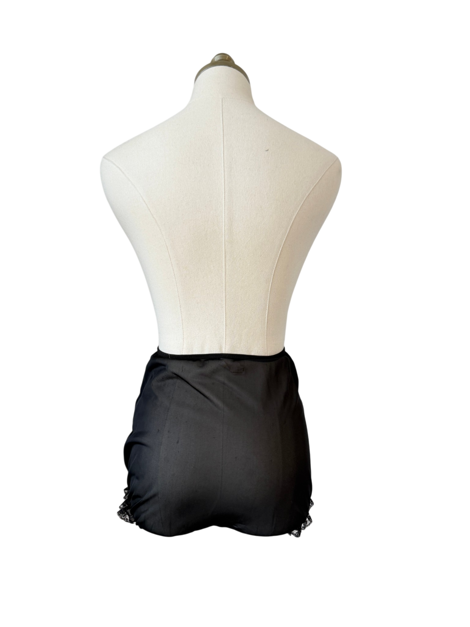 1950s Saks Fifth Avenue black sheer panties with lace ruffle trim and floral & bow appliques
