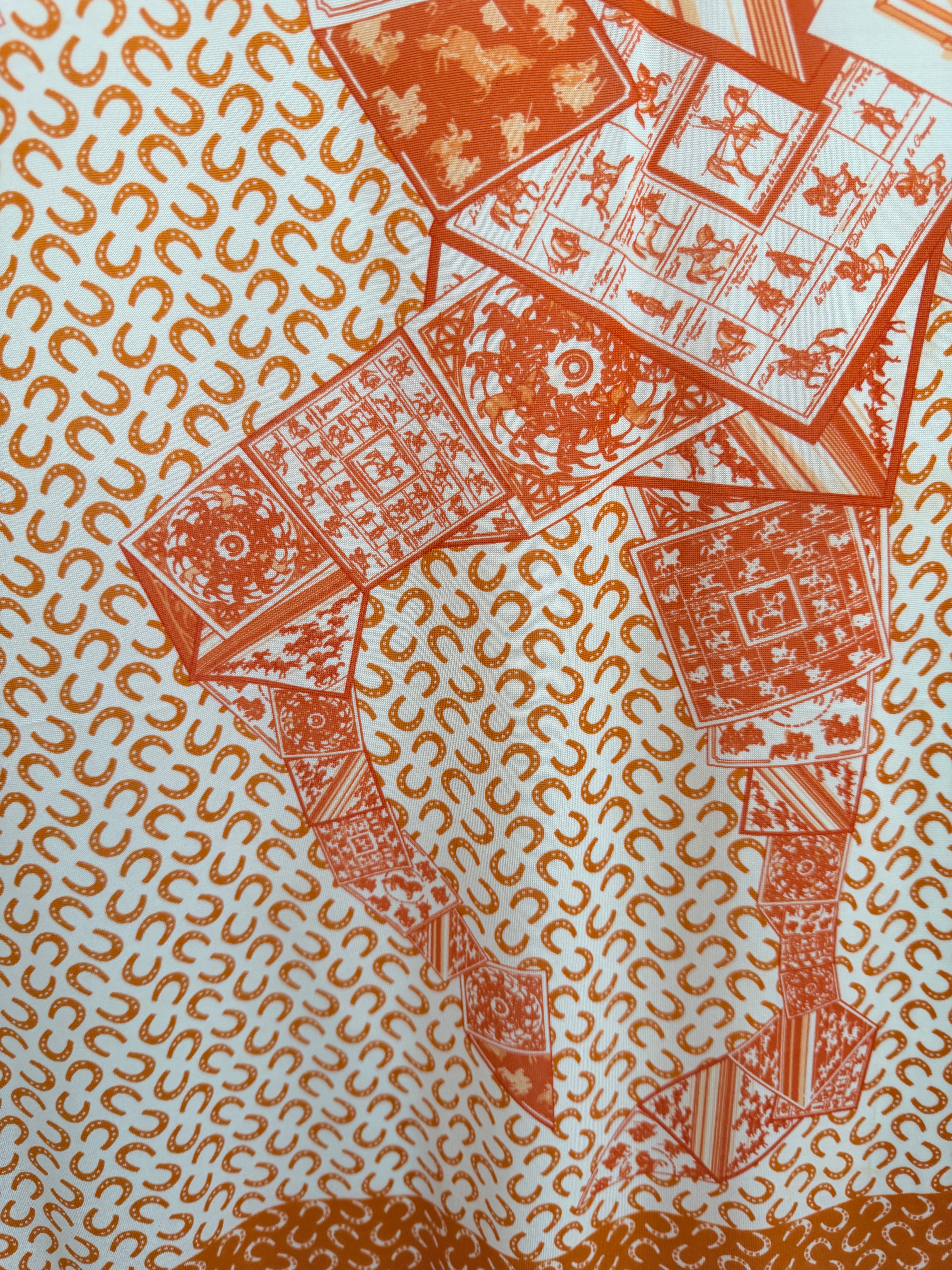Hermès “À Cheval sur Mon Carré” Orange & White Silk Stretch Scarf