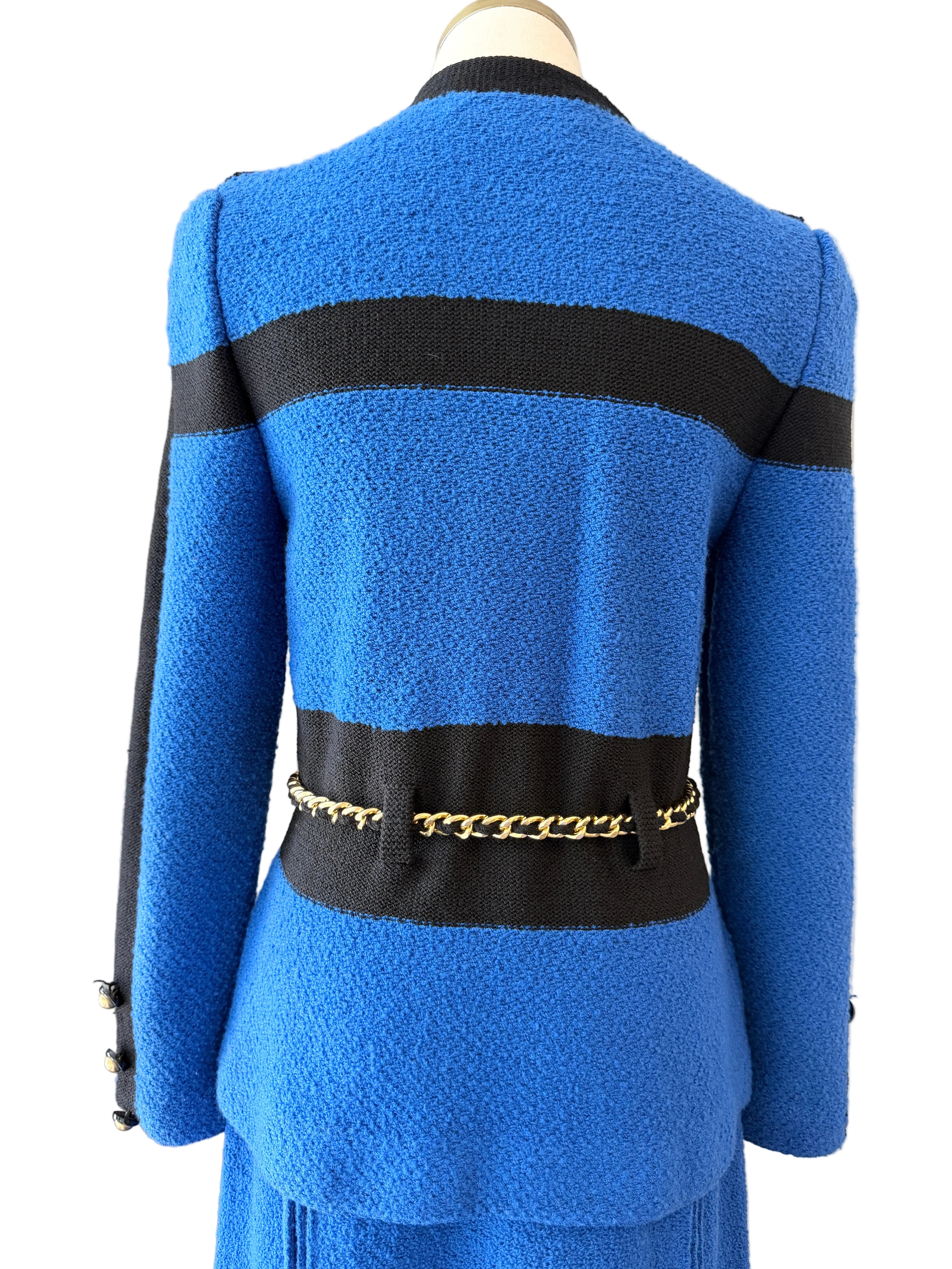 1960s Adolfo Royal Blue & Black Striped Knit Suit with Chain Belt & Pleated Hem Skirt