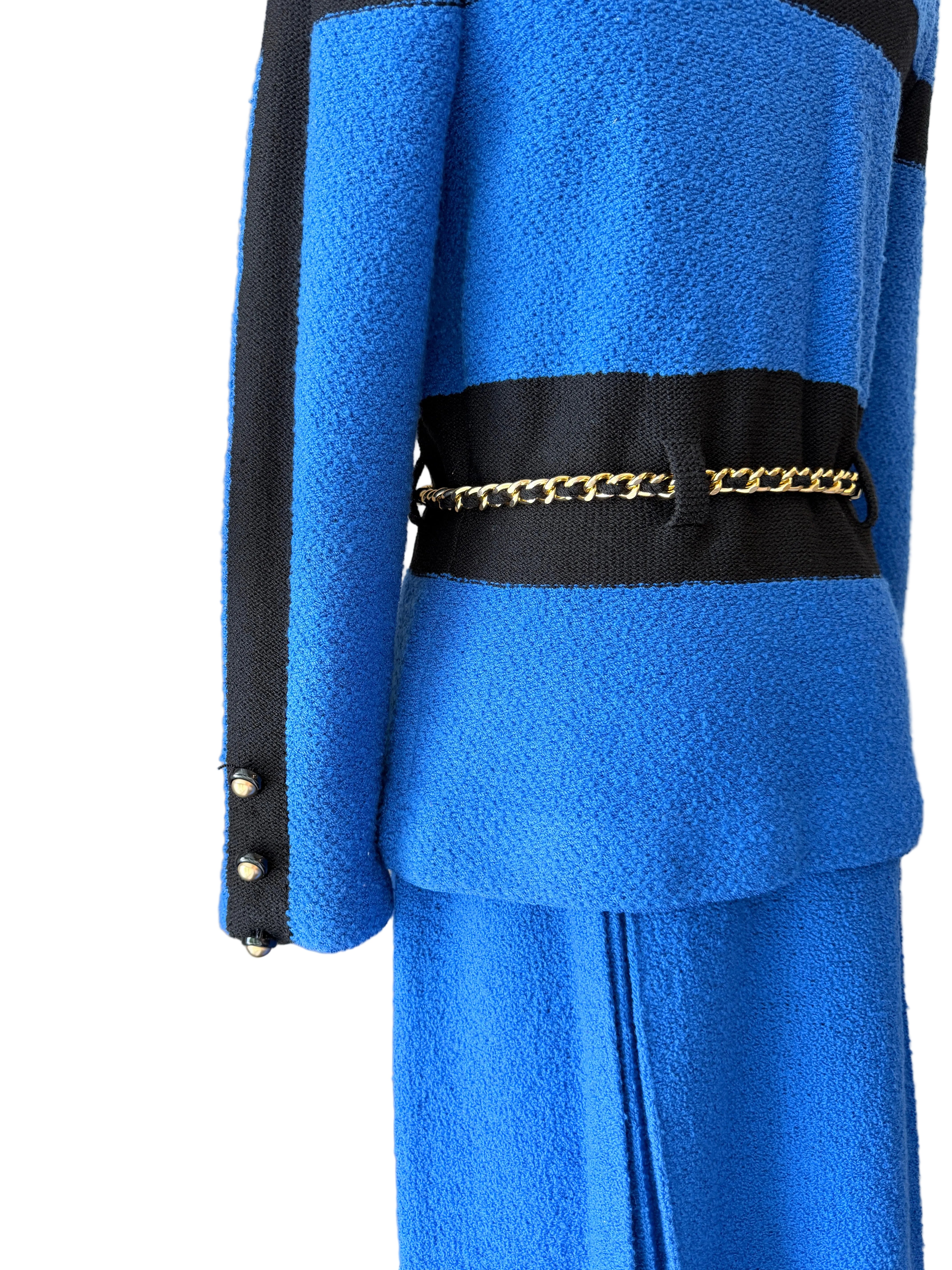 1960s Adolfo Royal Blue & Black Striped Knit Suit with Chain Belt & Pleated Hem Skirt