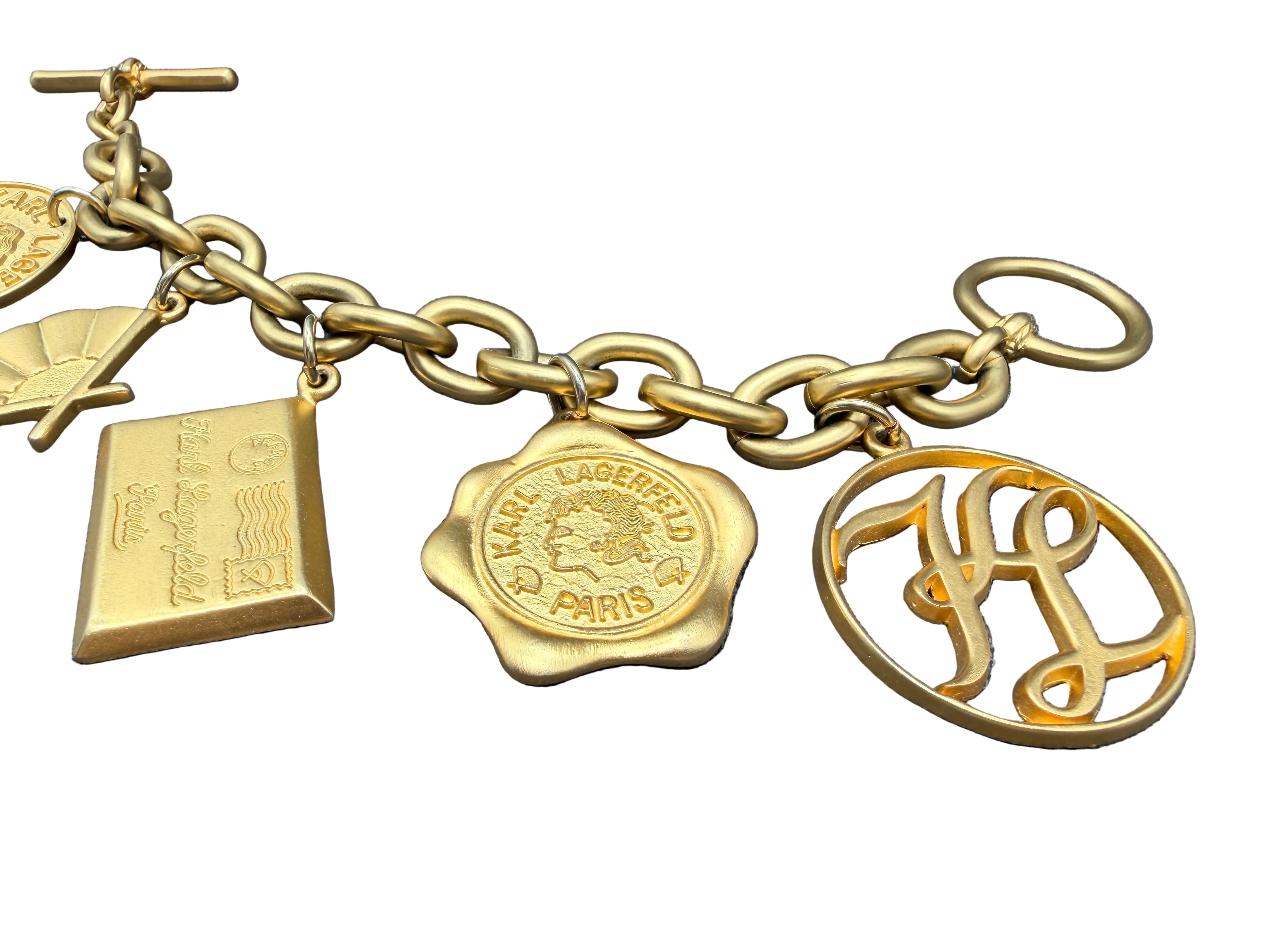 1980s Karl Lagerfeld Matte Gold-Tone Multi-Charm Runway Bracelet
